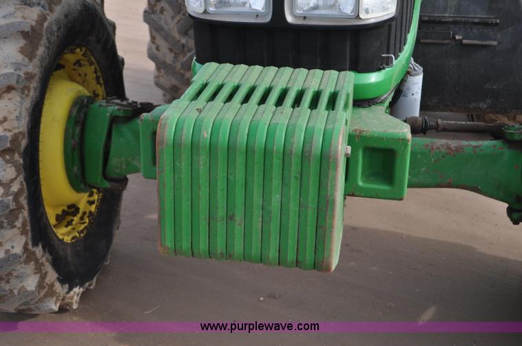 image for item G7138 2003 John Deere 7520 MFWD tractor