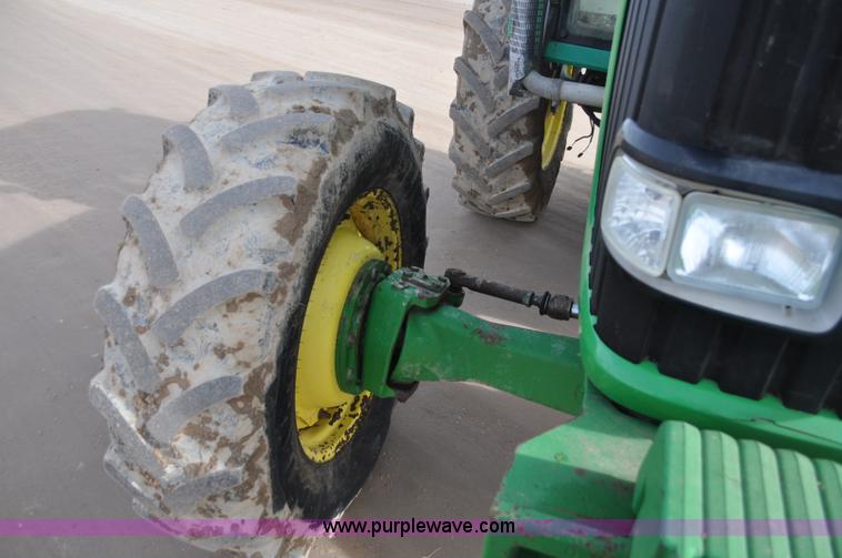 image for item G7138 2003 John Deere 7520 MFWD tractor