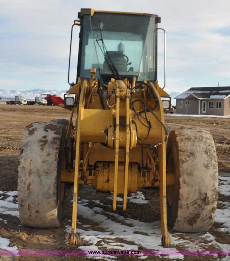 image for item G7164 2004 Caterpillar 928G wheel loader