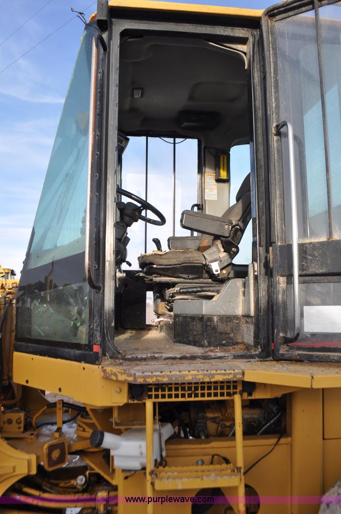 image for item G7164 2004 Caterpillar 928G wheel loader