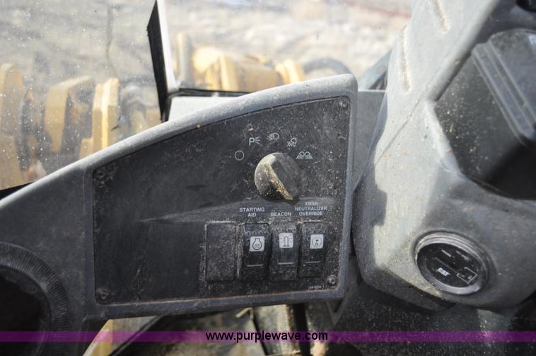 image for item G7164 2004 Caterpillar 928G wheel loader