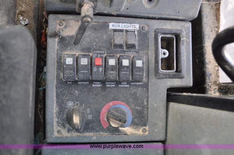 image for item G7164 2004 Caterpillar 928G wheel loader