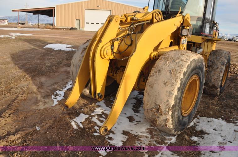 image for item G7164 2004 Caterpillar 928G wheel loader