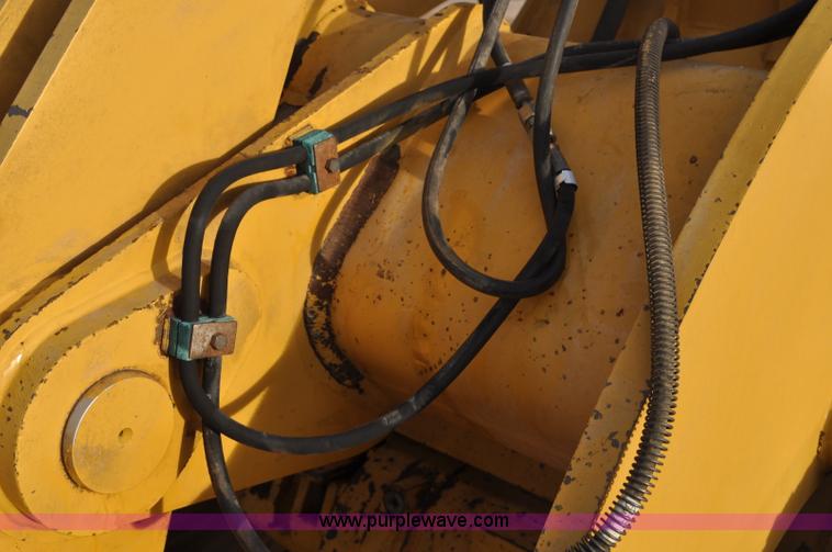 image for item G7164 2004 Caterpillar 928G wheel loader