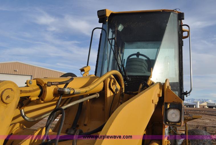 image for item G7164 2004 Caterpillar 928G wheel loader