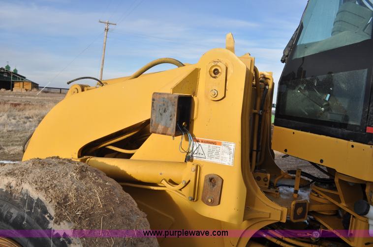 image for item G7164 2004 Caterpillar 928G wheel loader