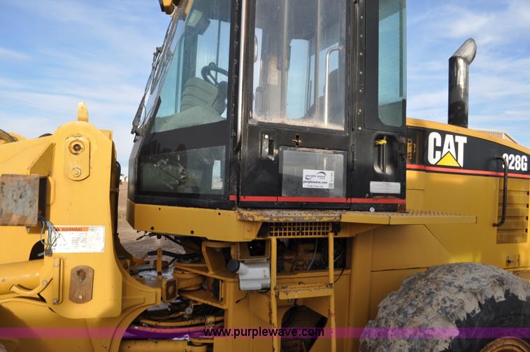 image for item G7164 2004 Caterpillar 928G wheel loader