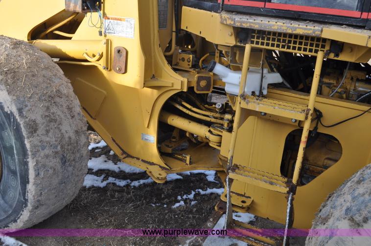 image for item G7164 2004 Caterpillar 928G wheel loader