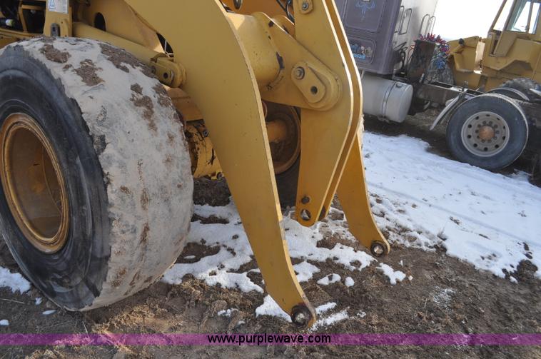 image for item G7164 2004 Caterpillar 928G wheel loader