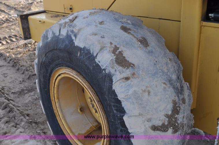 image for item G7164 2004 Caterpillar 928G wheel loader
