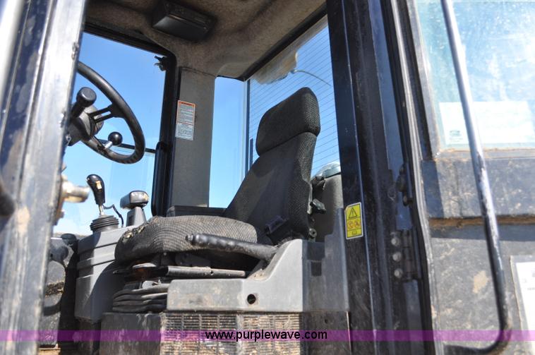 image for item G7173 2004 Caterpillar 928G wheel loader