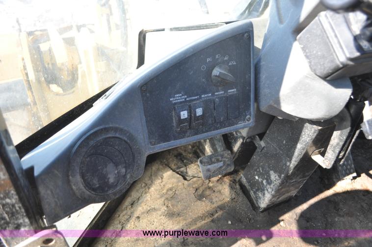 image for item G7173 2004 Caterpillar 928G wheel loader