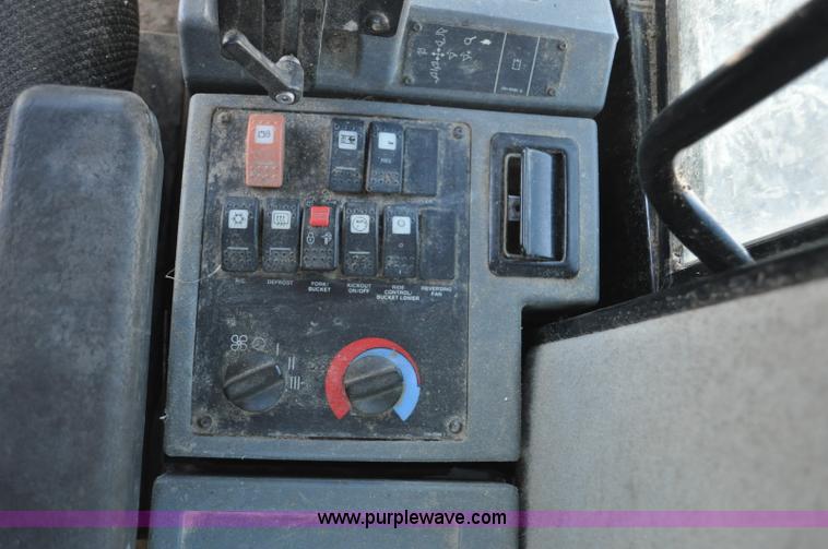 image for item G7173 2004 Caterpillar 928G wheel loader