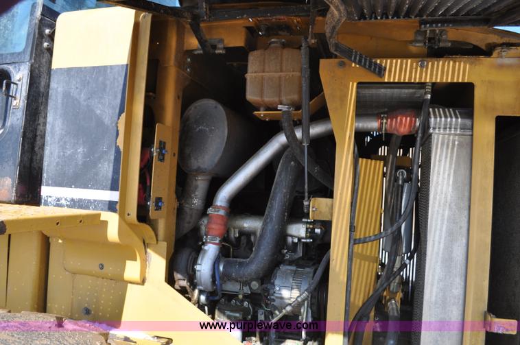 image for item G7173 2004 Caterpillar 928G wheel loader