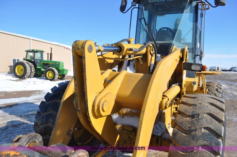image for item G7173 2004 Caterpillar 928G wheel loader
