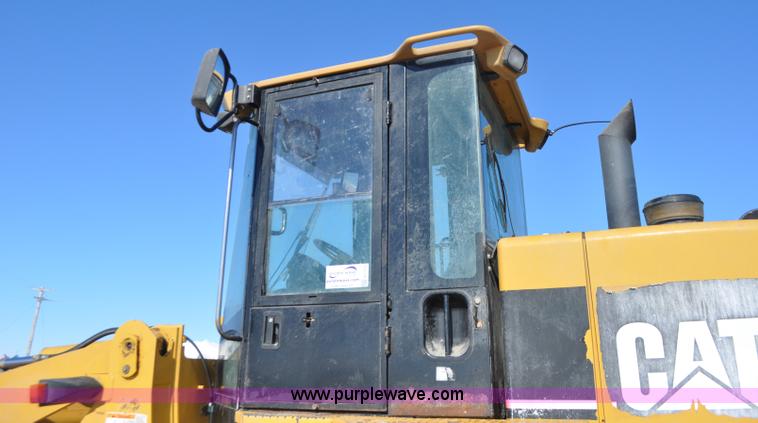 image for item G7173 2004 Caterpillar 928G wheel loader