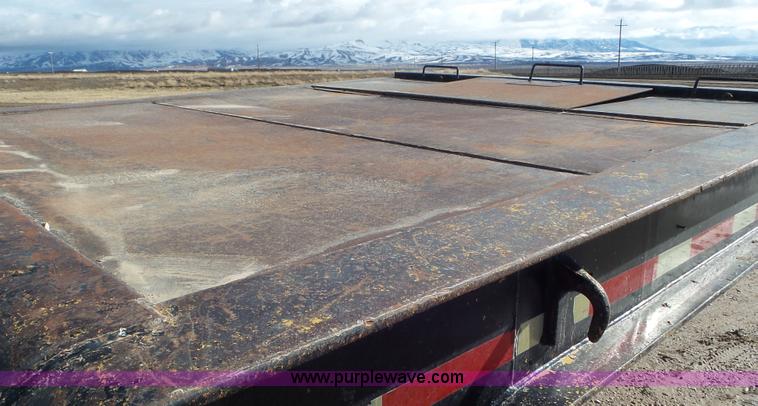 image for item J8365 1971 Fruehauf CN2-25-L drop deck trailer