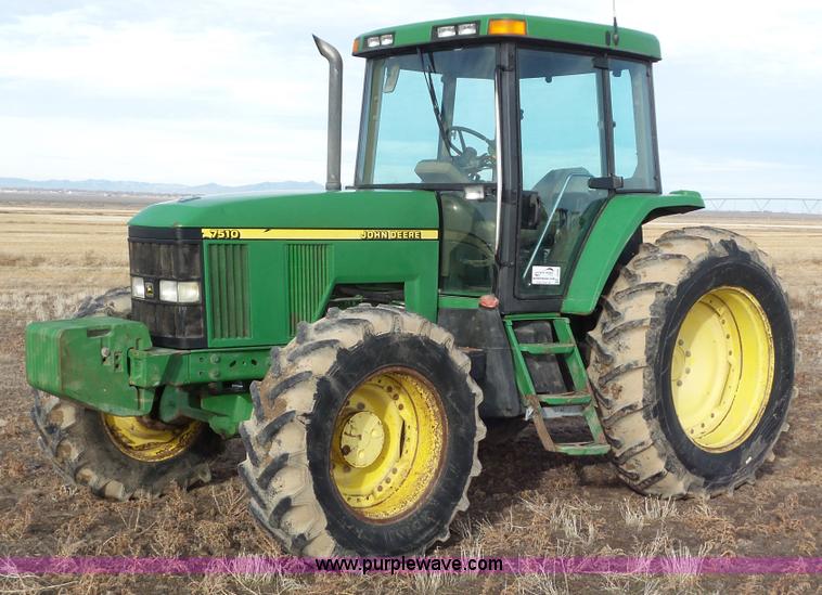 image for item K8306 2002 John Deere 7510 tractor