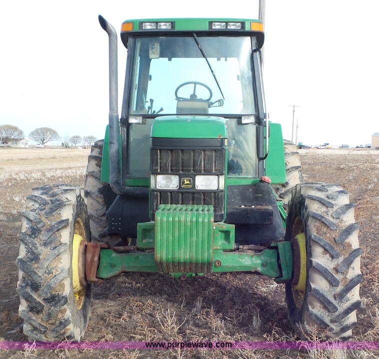 image for item K8306 2002 John Deere 7510 tractor