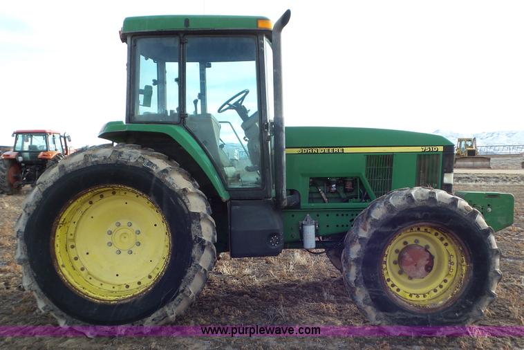 image for item K8306 2002 John Deere 7510 tractor