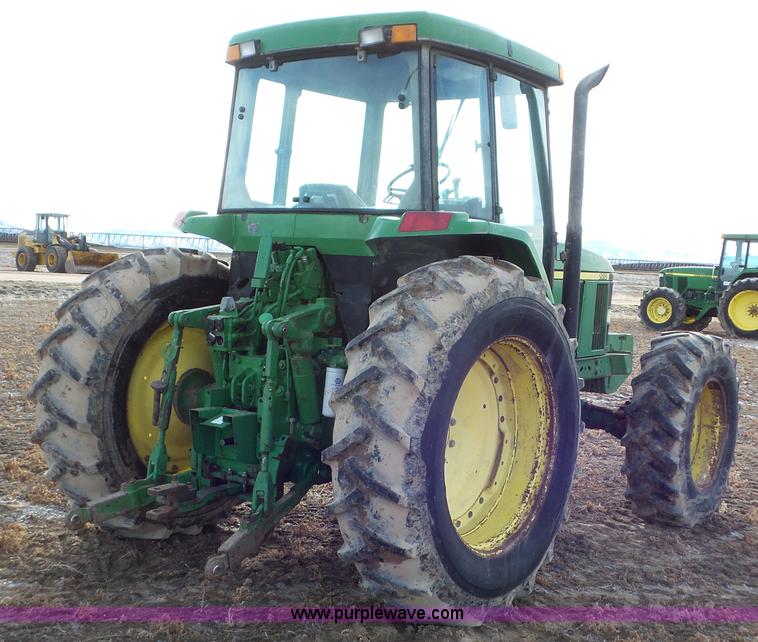 image for item K8306 2002 John Deere 7510 tractor