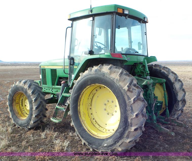 image for item K8306 2002 John Deere 7510 tractor