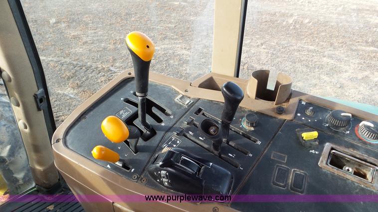 image for item K8306 2002 John Deere 7510 tractor