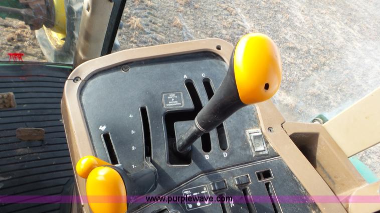 image for item K8306 2002 John Deere 7510 tractor