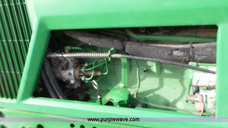 image for item K8306 2002 John Deere 7510 tractor