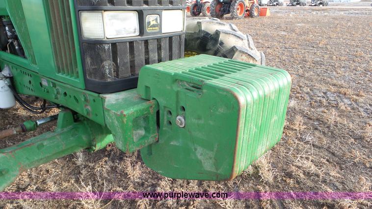 image for item K8306 2002 John Deere 7510 tractor
