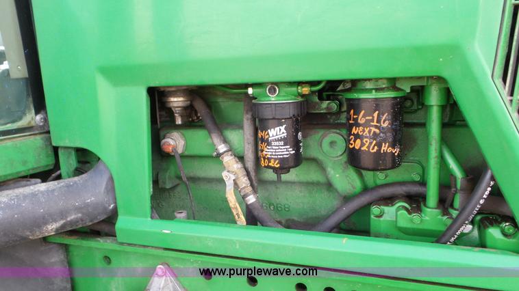 image for item K8306 2002 John Deere 7510 tractor