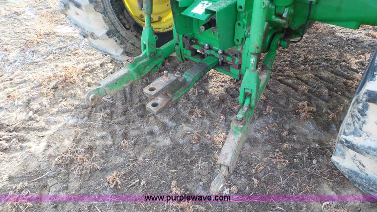 image for item K8306 2002 John Deere 7510 tractor