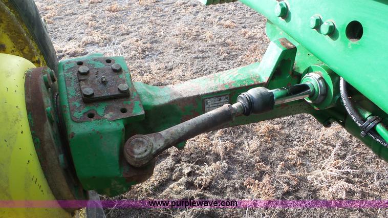image for item K8306 2002 John Deere 7510 tractor