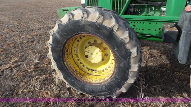 image for item K8306 2002 John Deere 7510 tractor