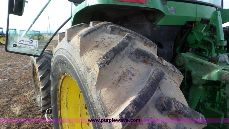 image for item K8306 2002 John Deere 7510 tractor