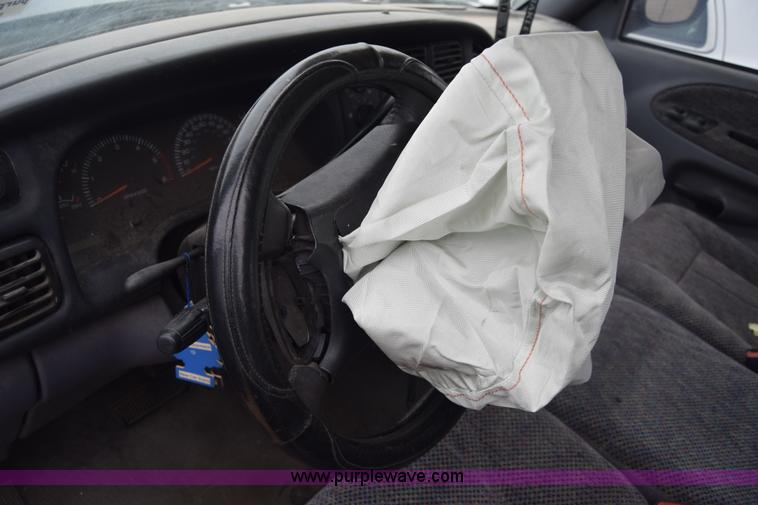 image for item L1072 1998 Dodge Ram 1500 Quad Cab pickup truck