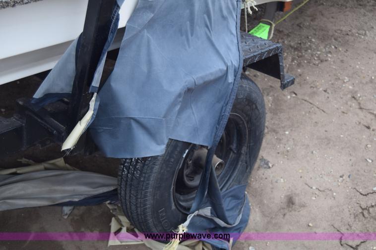 image for item L1073 1975 Ozark boat