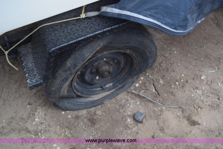 image for item L1073 1975 Ozark boat