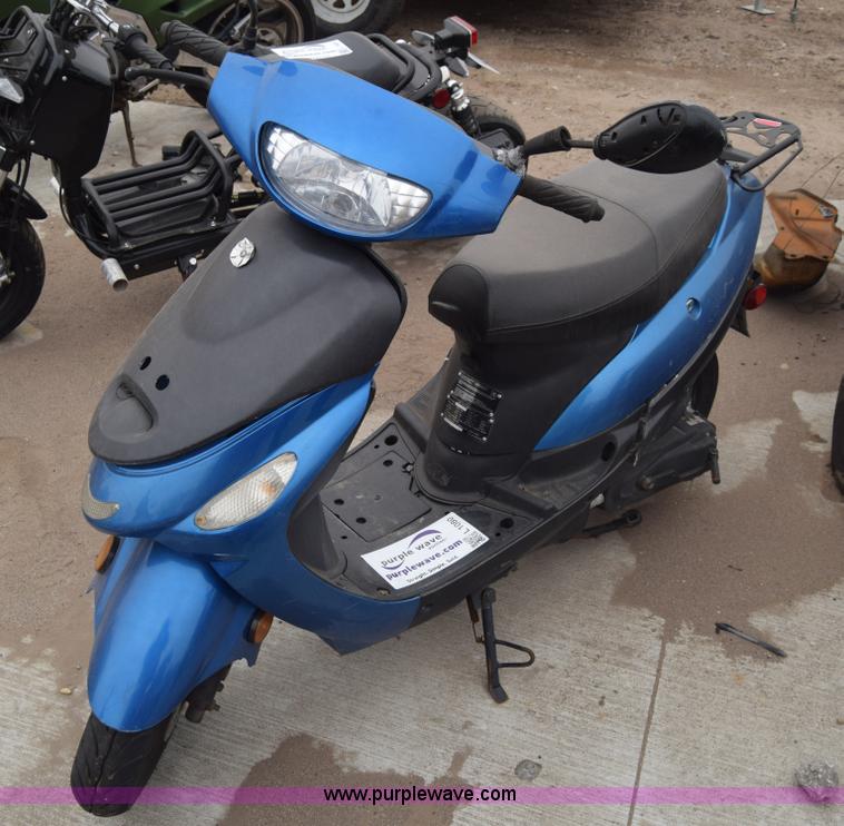 image for item L1080 2014 Tao Tao moped