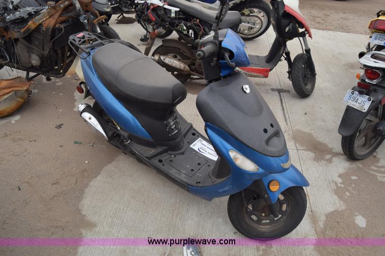 image for item L1080 2014 Tao Tao moped