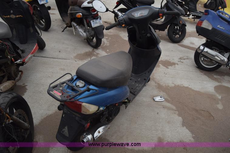 image for item L1080 2014 Tao Tao moped