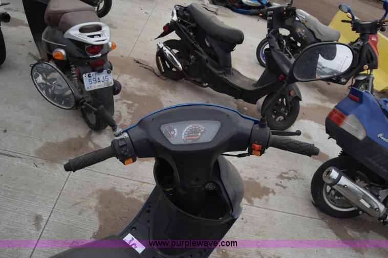 image for item L1080 2014 Tao Tao moped
