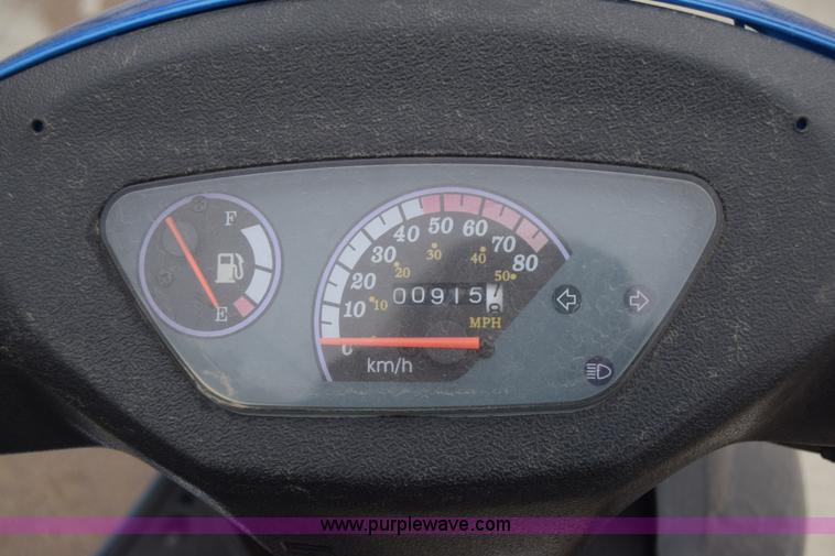 image for item L1080 2014 Tao Tao moped