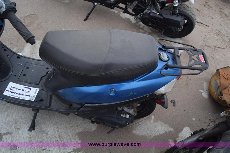 image for item L1080 2014 Tao Tao moped