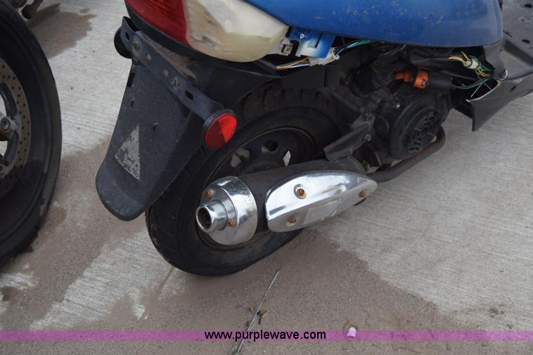 image for item L1080 2014 Tao Tao moped