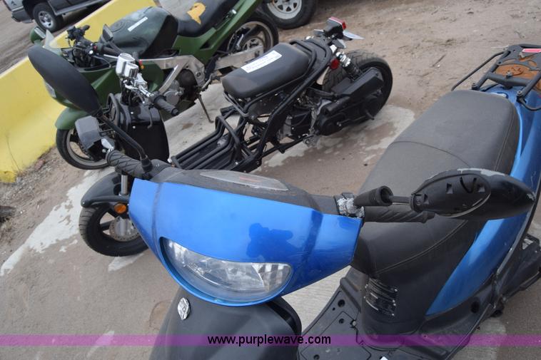 image for item L1080 2014 Tao Tao moped