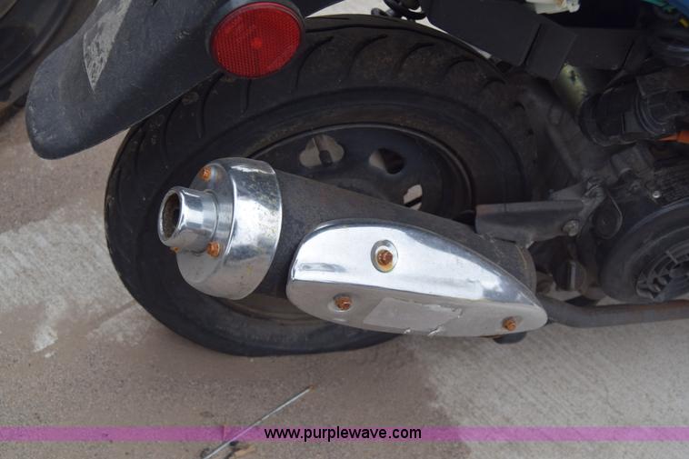 image for item L1080 2014 Tao Tao moped