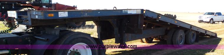 image for item J1304 1983 Wisconsin 2500-22 tilt deck trailer