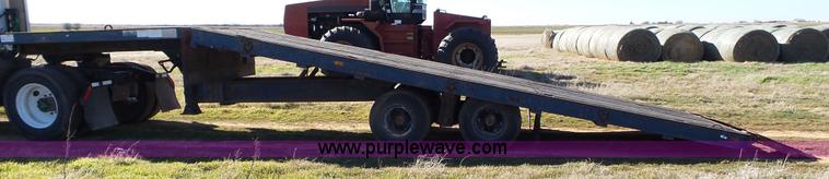 image for item J1304 1983 Wisconsin 2500-22 tilt deck trailer