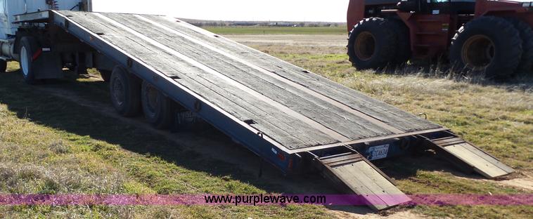 image for item J1304 1983 Wisconsin 2500-22 tilt deck trailer